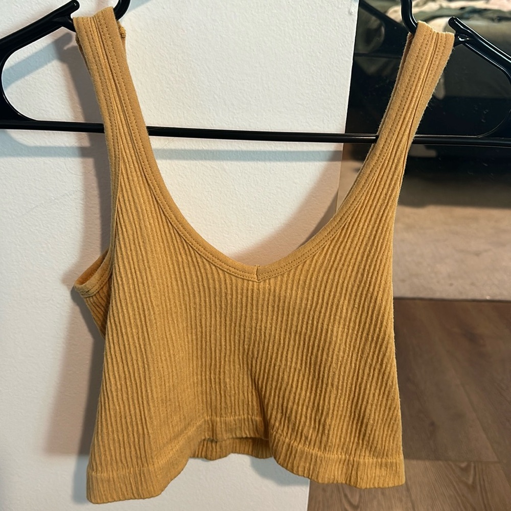 Urban Outfitters tank top size small and Dijon mustard color.